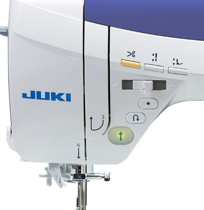 DX-2000QVP - our quilting machine with extra large space between needle and arm and many fun quilting feet included.