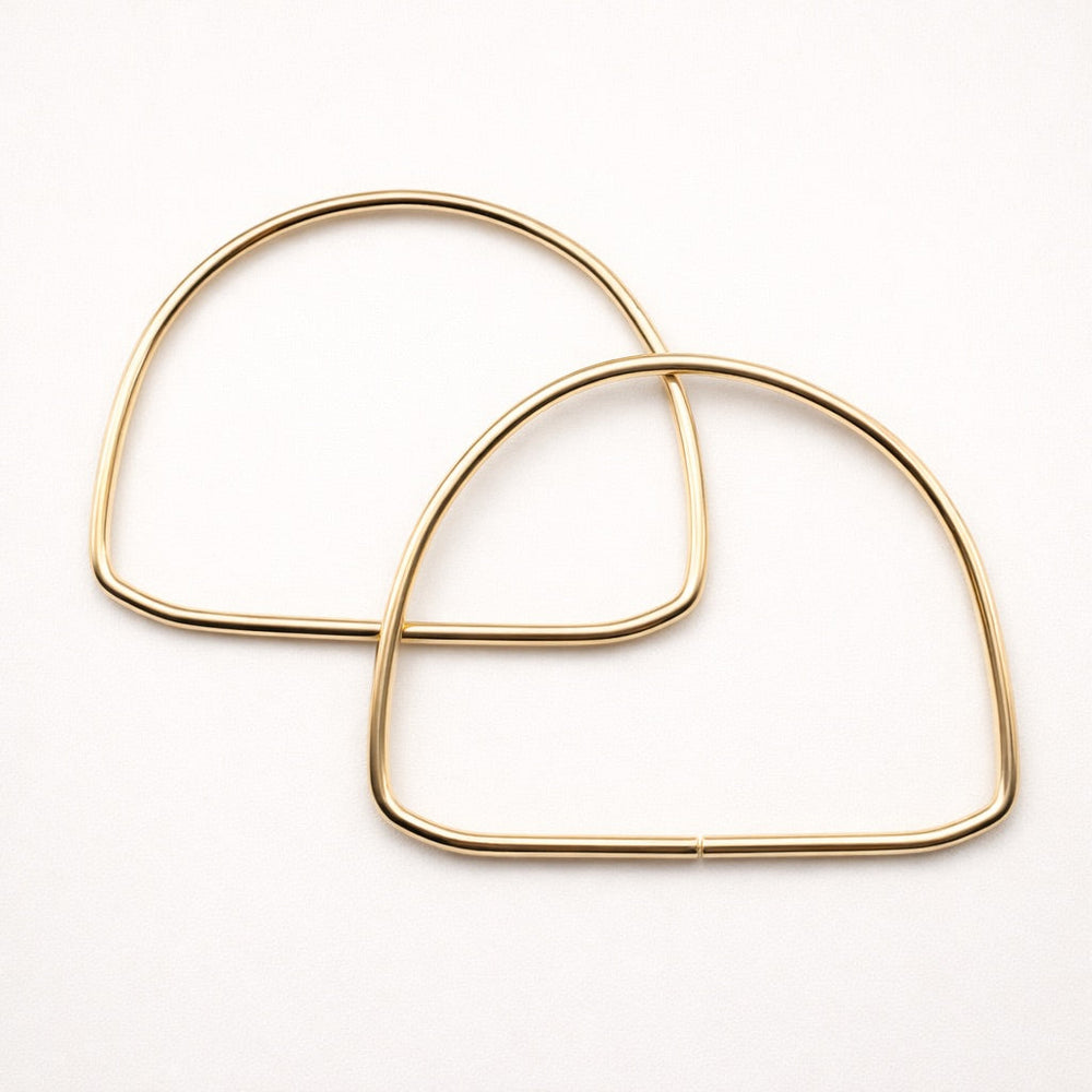 Halvcirkelformade handtag i förgyllt metall – 14 cm (par)